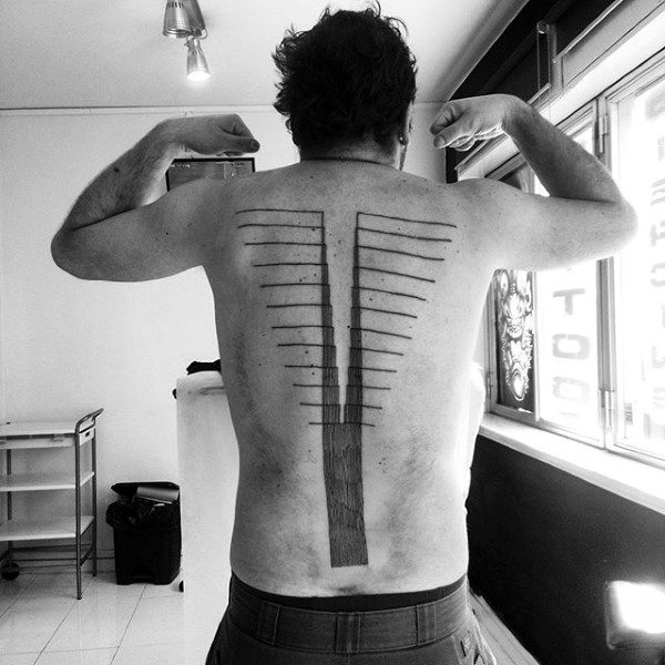 Abstract linework spinal cord tattoo