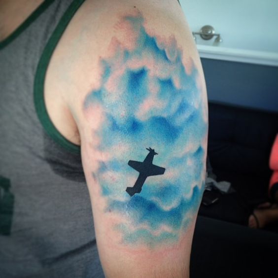 Airplane tattoo in the Blue Sky