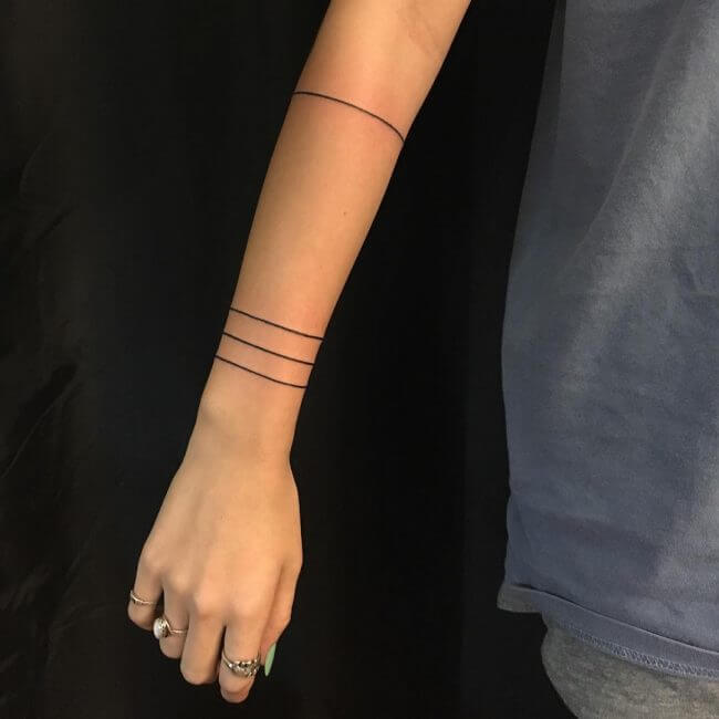 bicep band tattoos