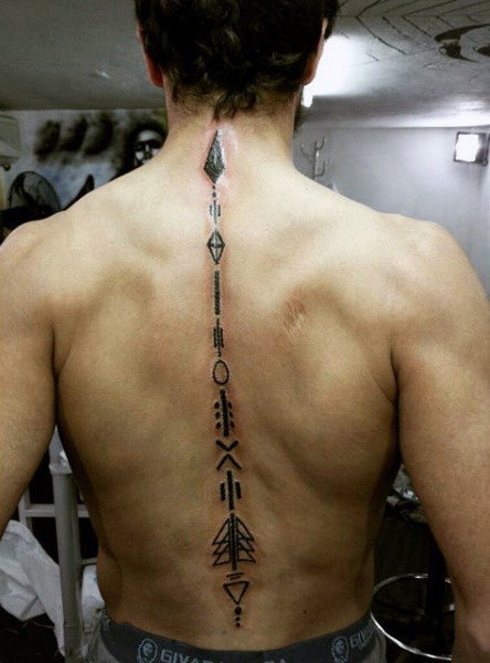 Arrow full spine tattoo