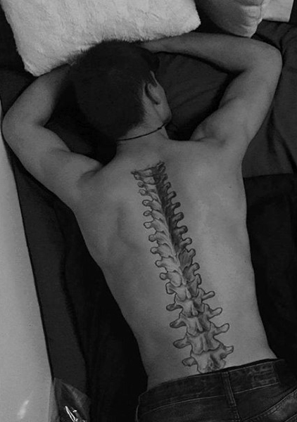 Cool spinal cord tattoo on man