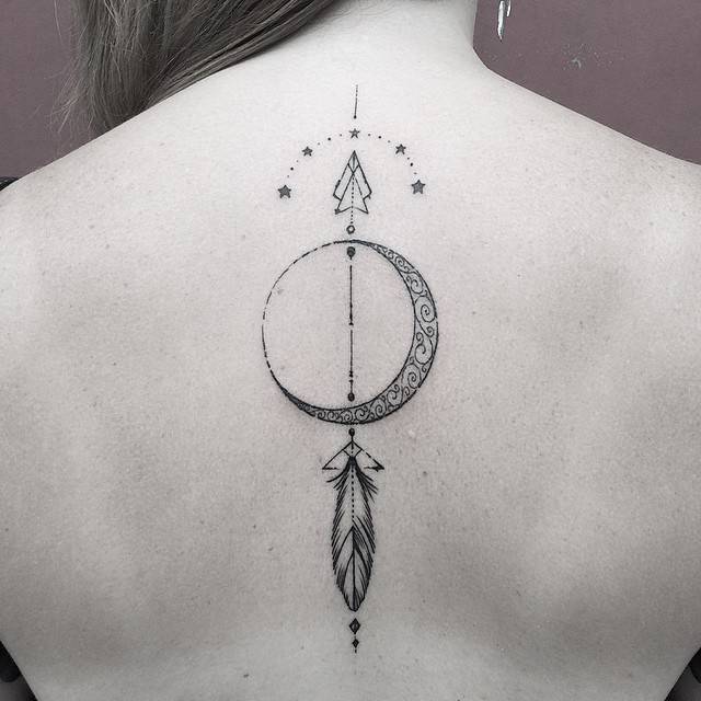Crescent Moon And Arrow Tattoo On The Back