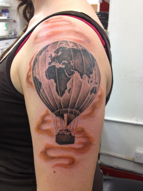 travel tattoo shoulder