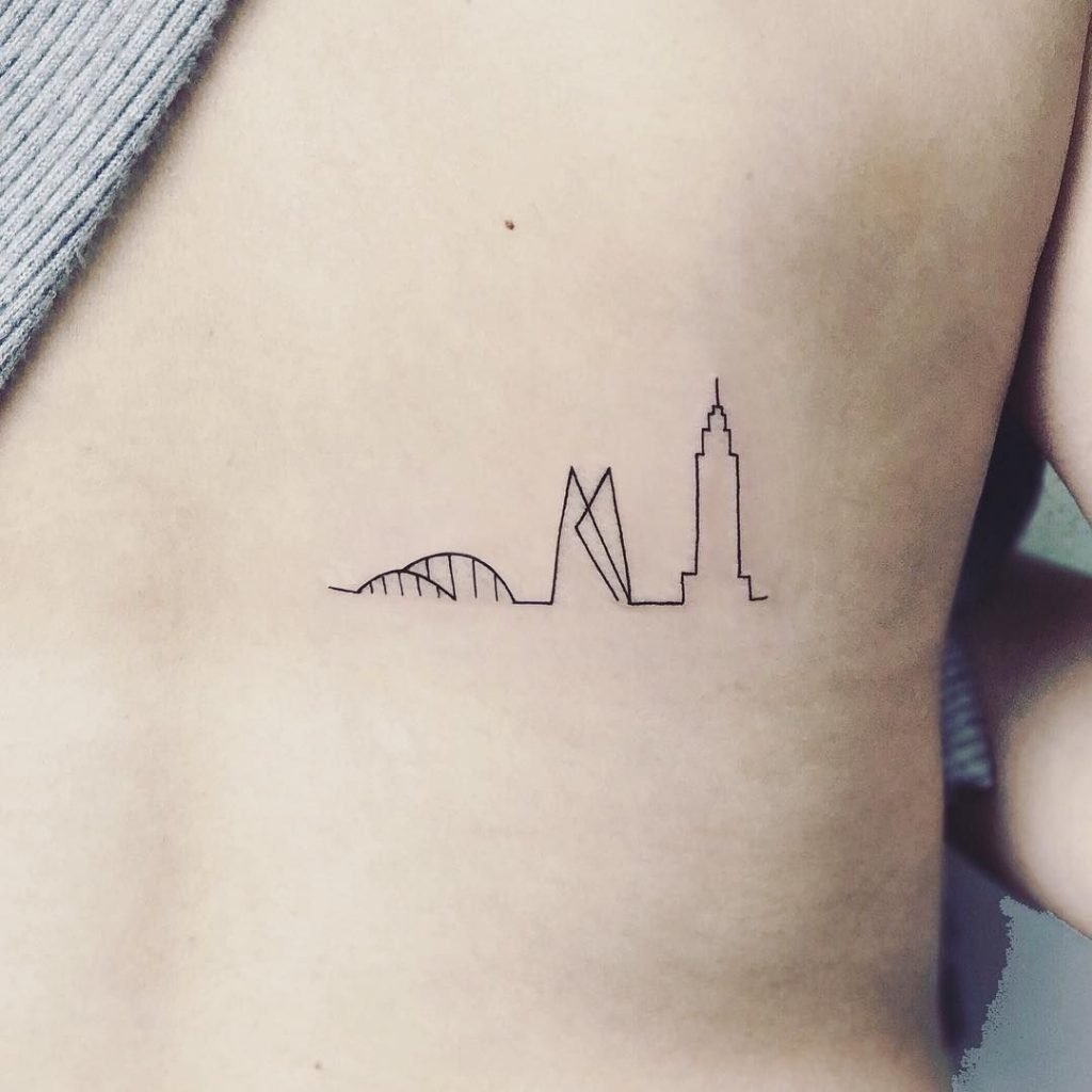 travel small tattoo