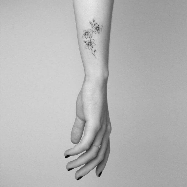 Small Flower Tattoo on Hand