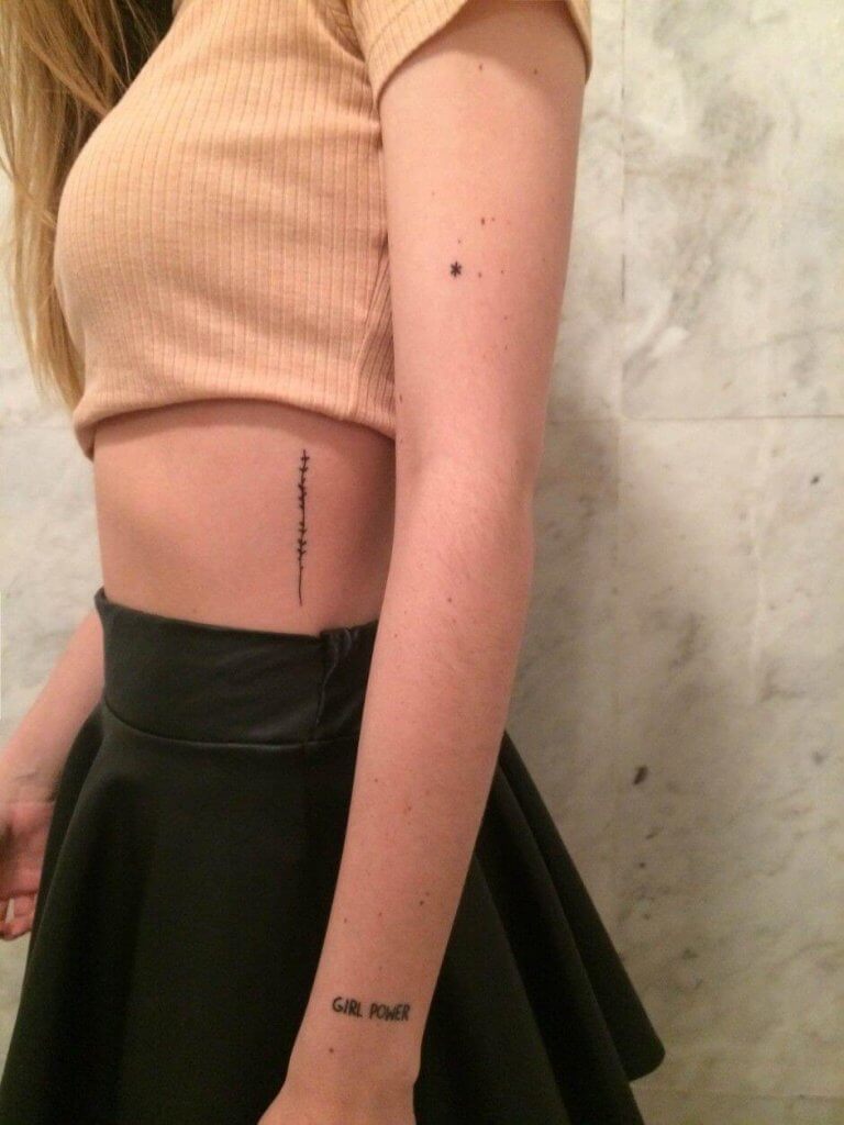 Small GIRL POWER Tattoo on rib