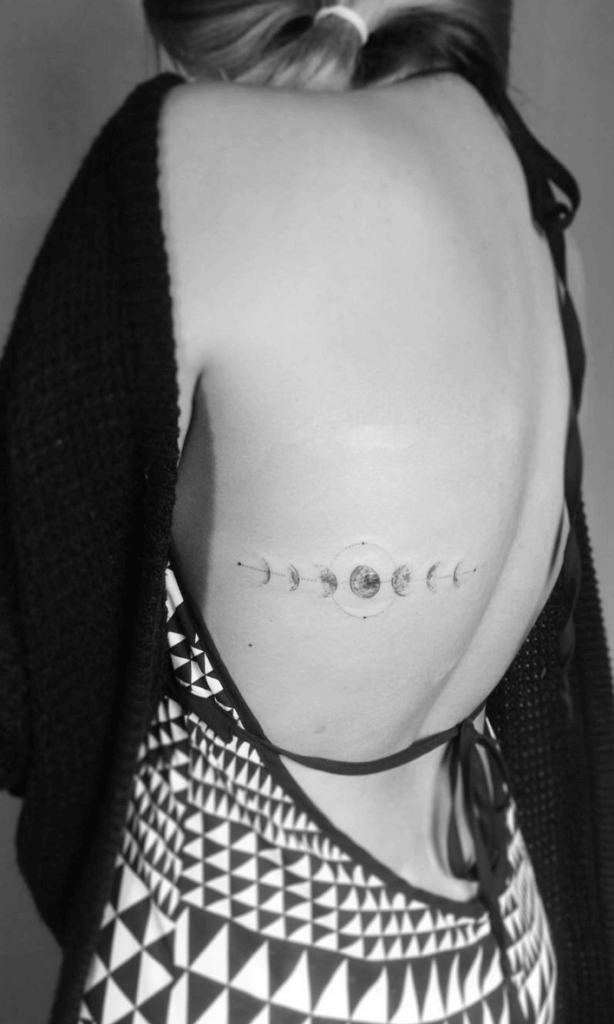 Small Hand Poked Moon Phase Tattoo girl