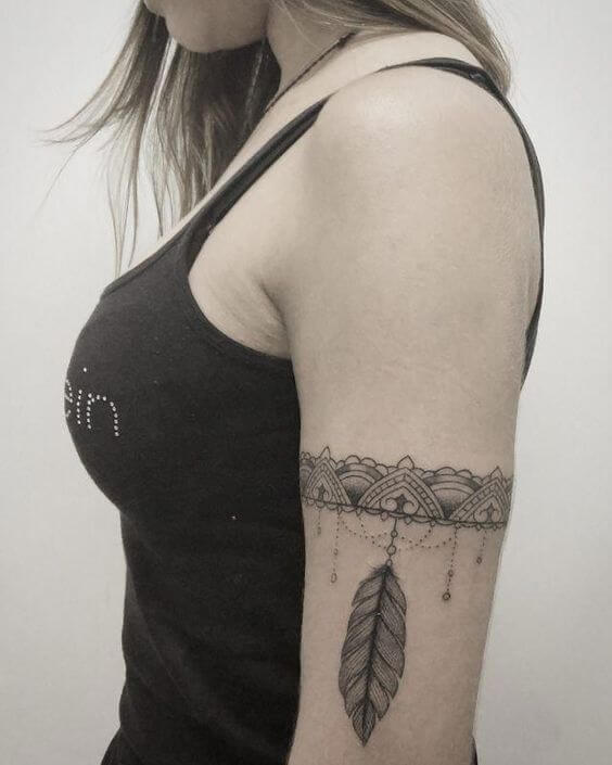 Women dotwork band tattoo with flowers around leg  Band tattoo Tattoos  Cuff tattoo