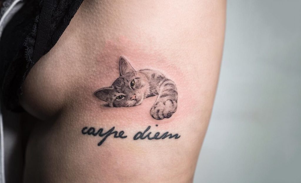 Name tattoo with cat