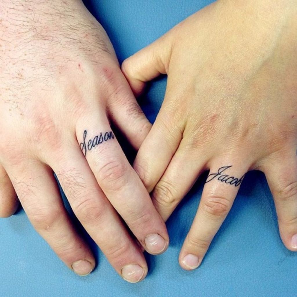 Names tattoos on ring