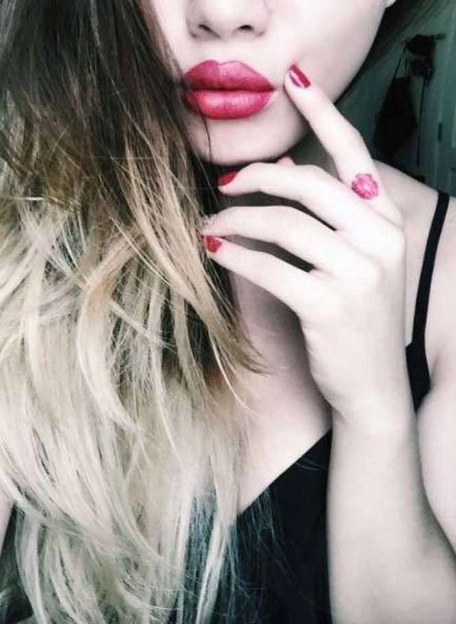 Lips finger tattoos