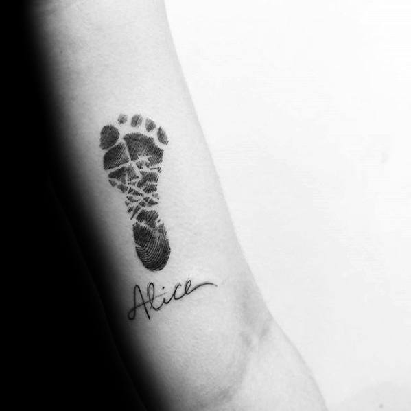 Name tattoo with footprints