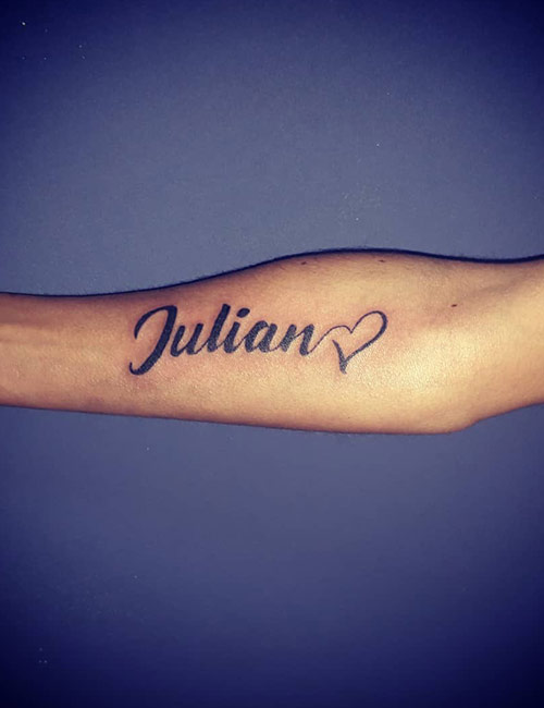 Name tattoo with the heart ending