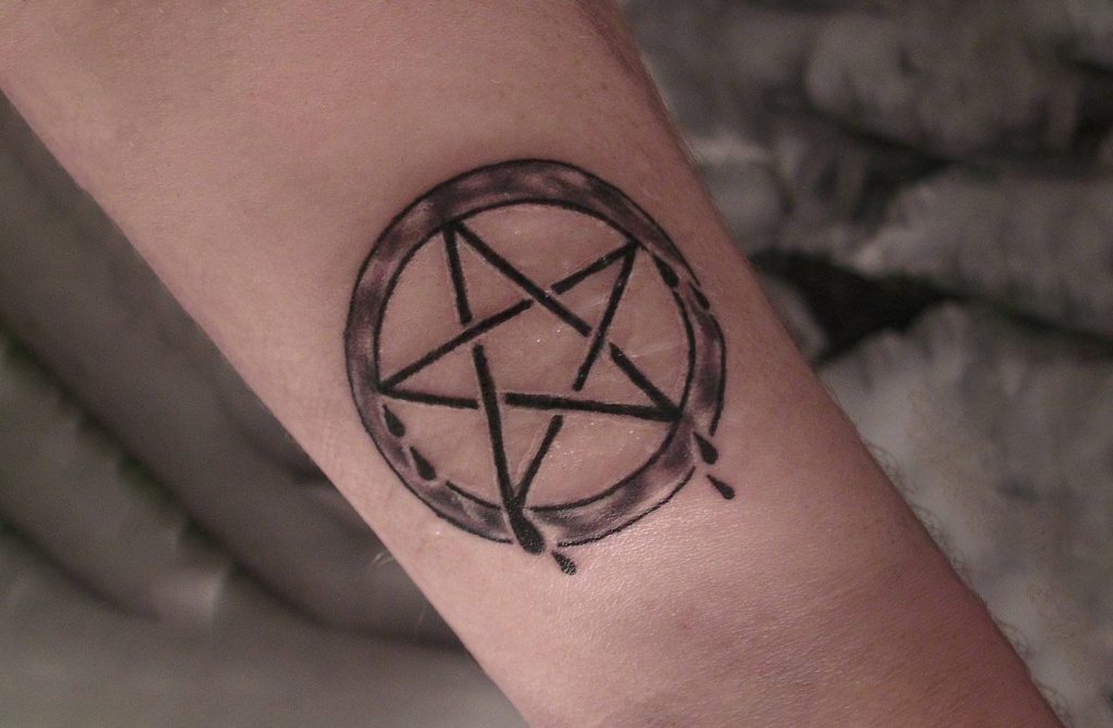 Pentagram Star Tattoo.
