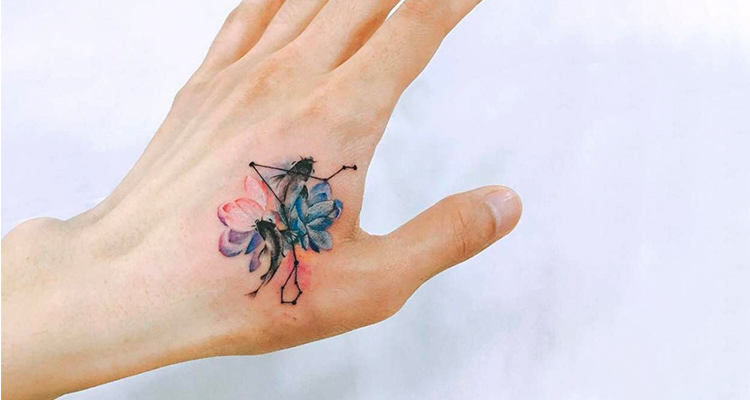 Pisces fish on your hand tattoo