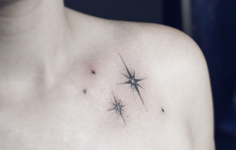 8. Simple star tattoo on neck for girls - wide 4