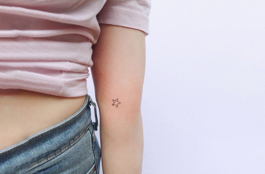 Single Star tattoo design on arm