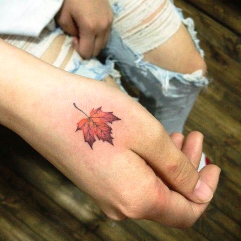 Leaf tattoo on hand