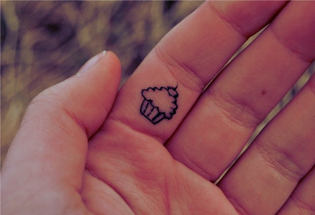 Tiny Cupcake Finger tattoo designs 