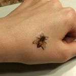 cute bumblebee on your hand