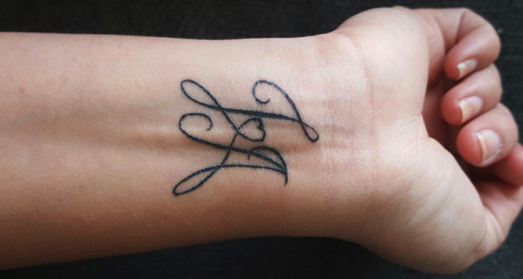 initials on your wrist or on your chest tattoo