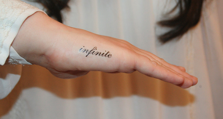 loved ones name on your hand tattoo