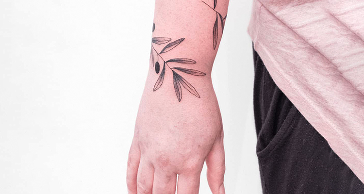 olive branch on your hand tattoo