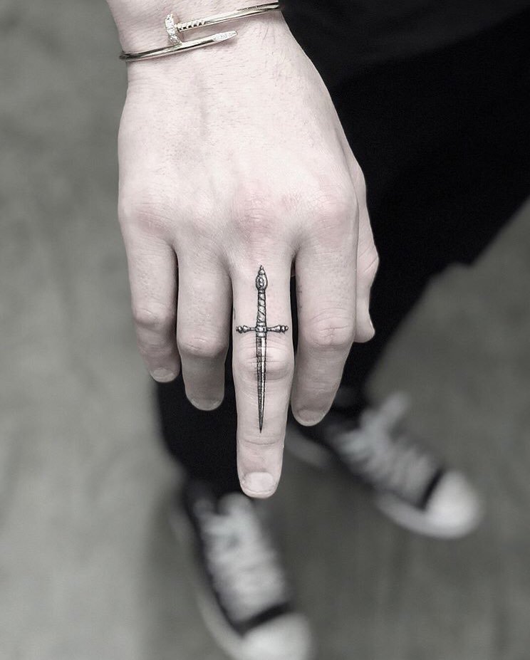 Sword finger tattoos Designn