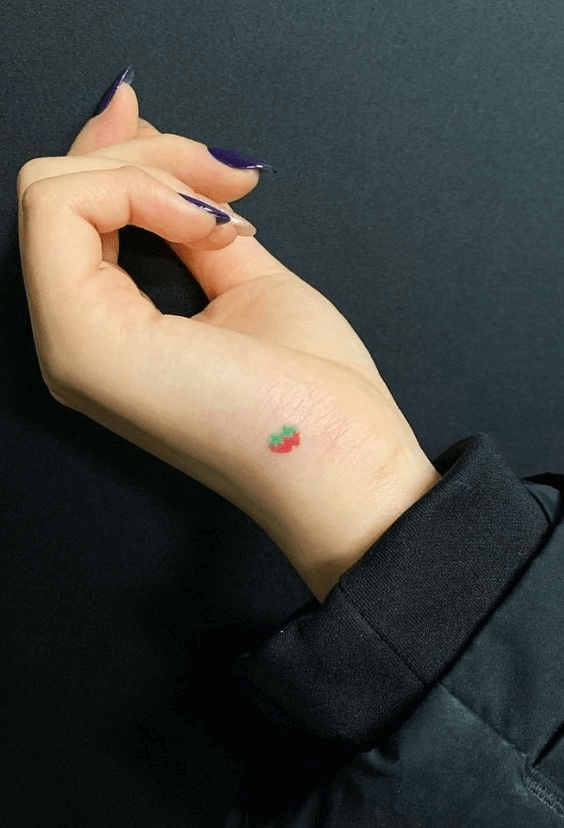 Tiny Strawberry Tattoo on wrist