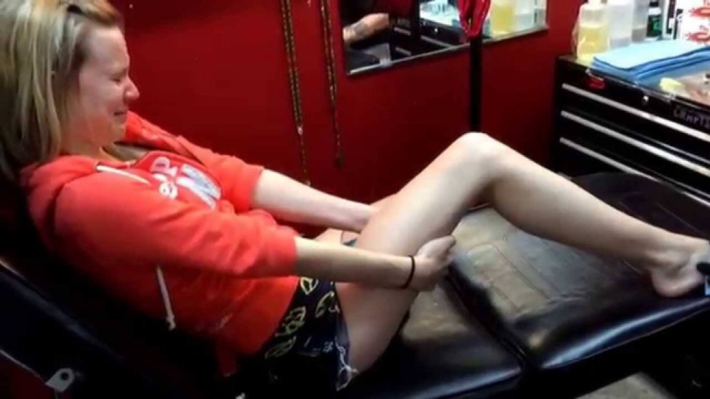 tattoo hurting girl