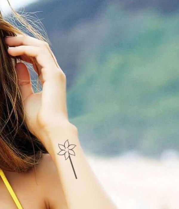 A Pinwheel Hand Tattoo for women ideas - Simple Hand Tattoo Ideas For Girls