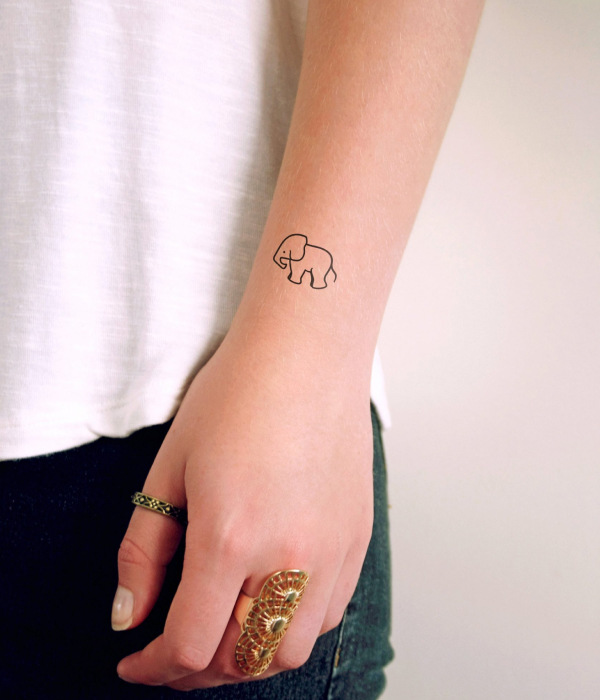 An Elephant Hand Tattoo ideas - Simple Hand Tattoo Ideas For Girls