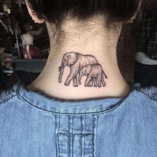 Elephant with baby elephant back tattoo