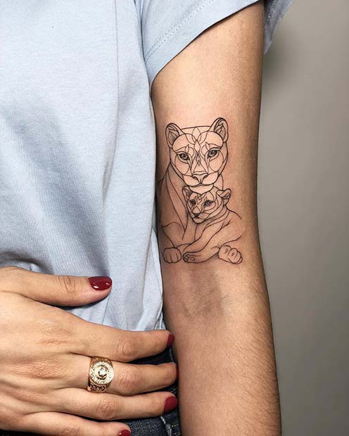 Lioness with cub tattoo image