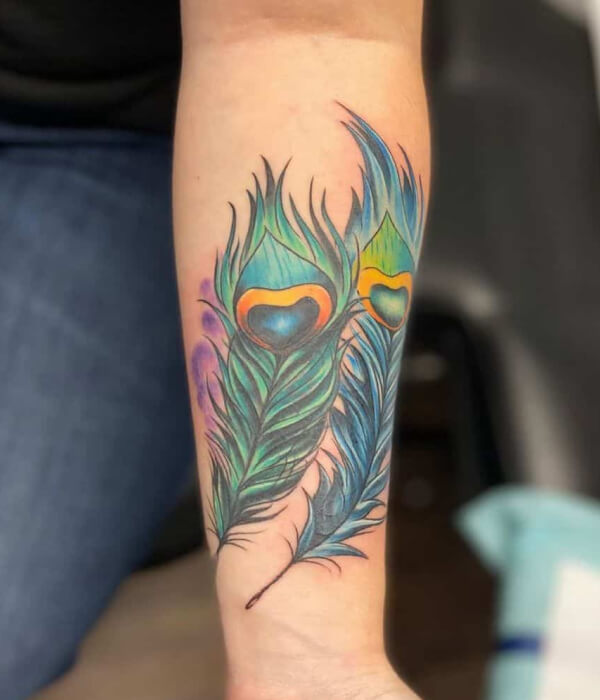 Peacock Feather Hand Tattoo