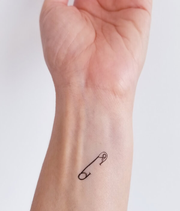 Safety Pin Hand tattoo for girls