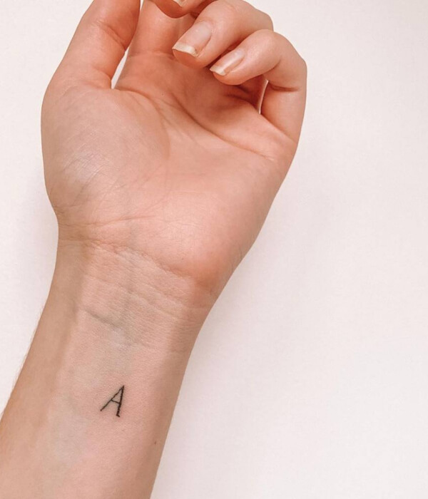Single Letter Hand Tattoo