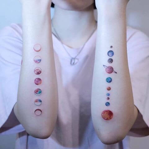 Solar system colored tattoo