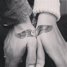 Split Heart Couple Tatto