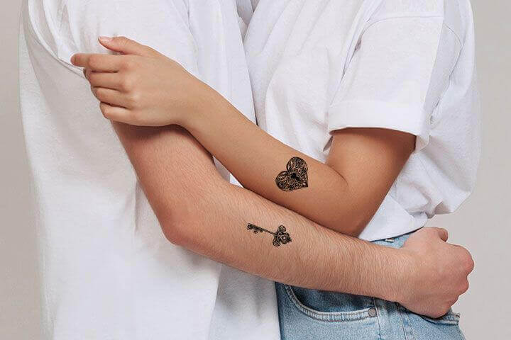 Trending Key and Lock couple tattoo