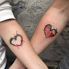 colorful heart tattoo for couple