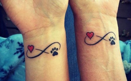 Heart with paw tattoos