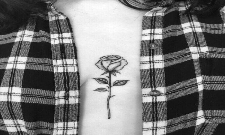 Black Rose Tattoo On The Sternum