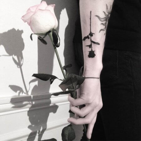 black rose tattoo hand