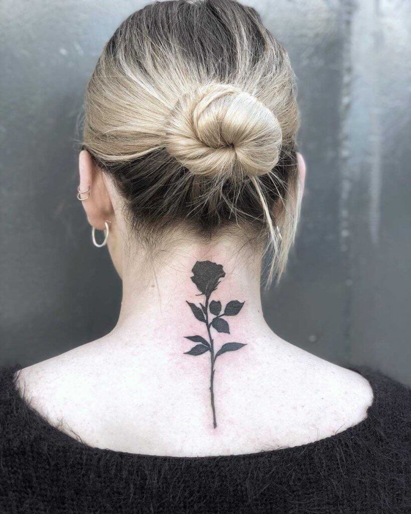 BlackSmall Rose Tattoo On The Back