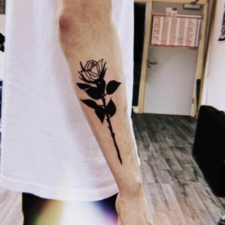 Black Rose Tattoo On The Right Forearm