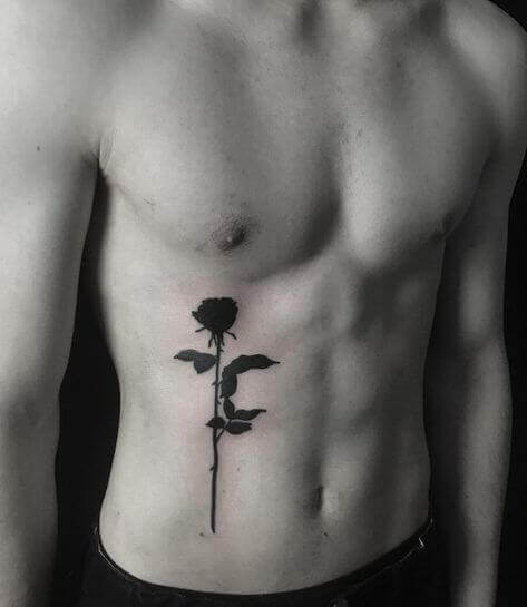 Black rose tattoo designs on men
