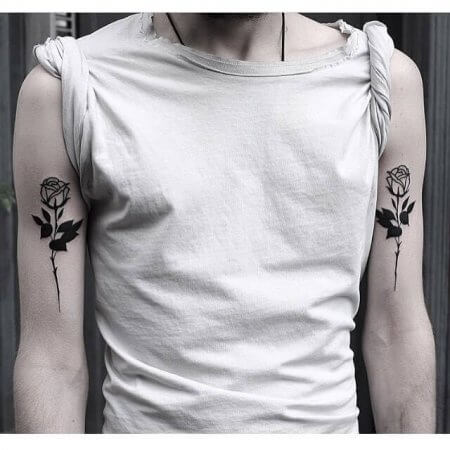 two Black Rose Tattoos on Arm