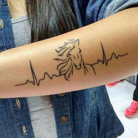 Heartbeat with horse tatoo