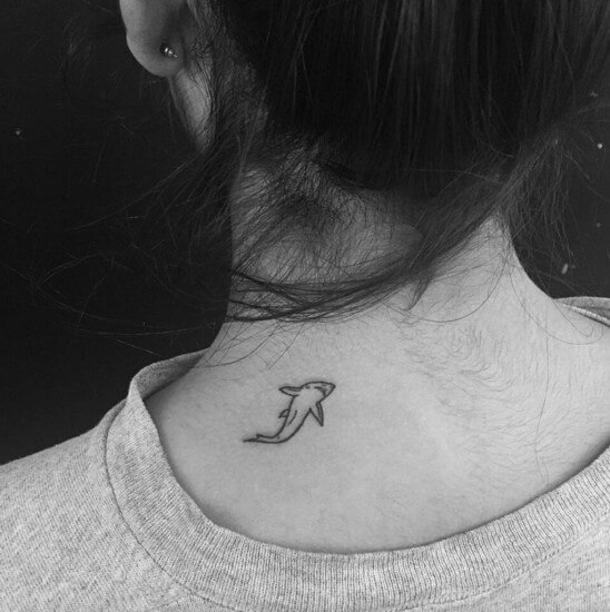 Minimalist Whale Tattoo on neck